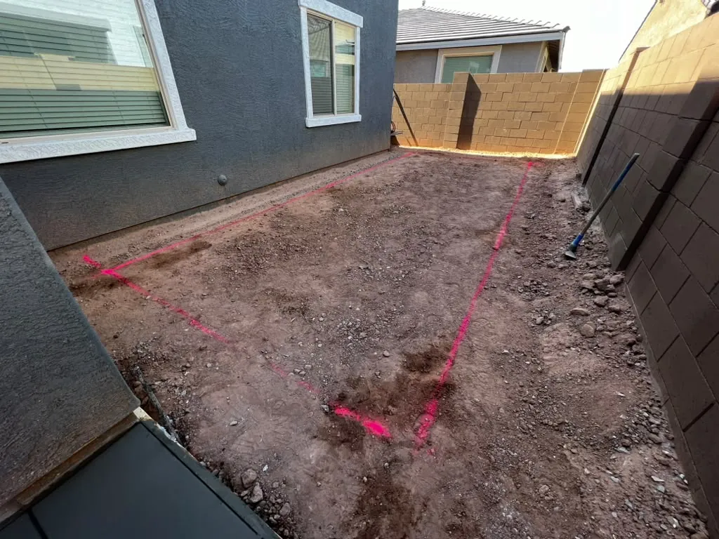 Yard marked out in layout paint before the ground is worked