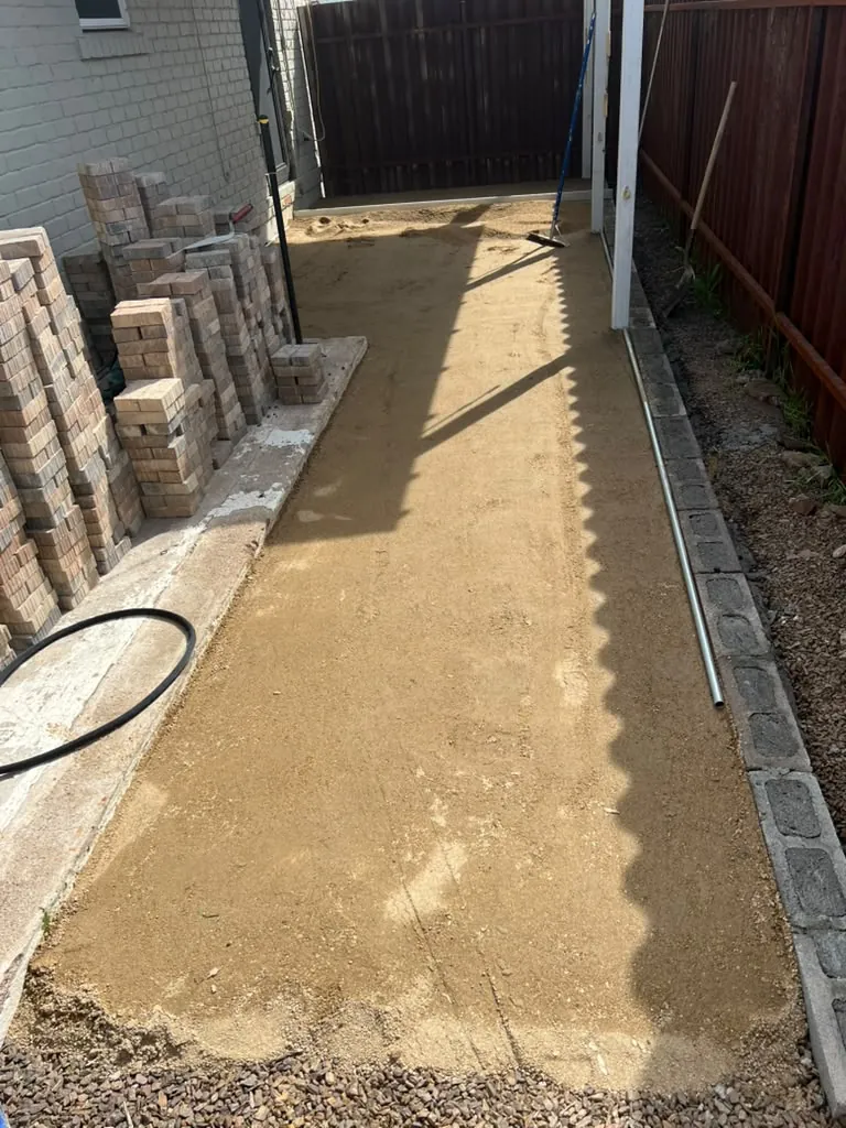 Walkway base screeded flat before the pavers
